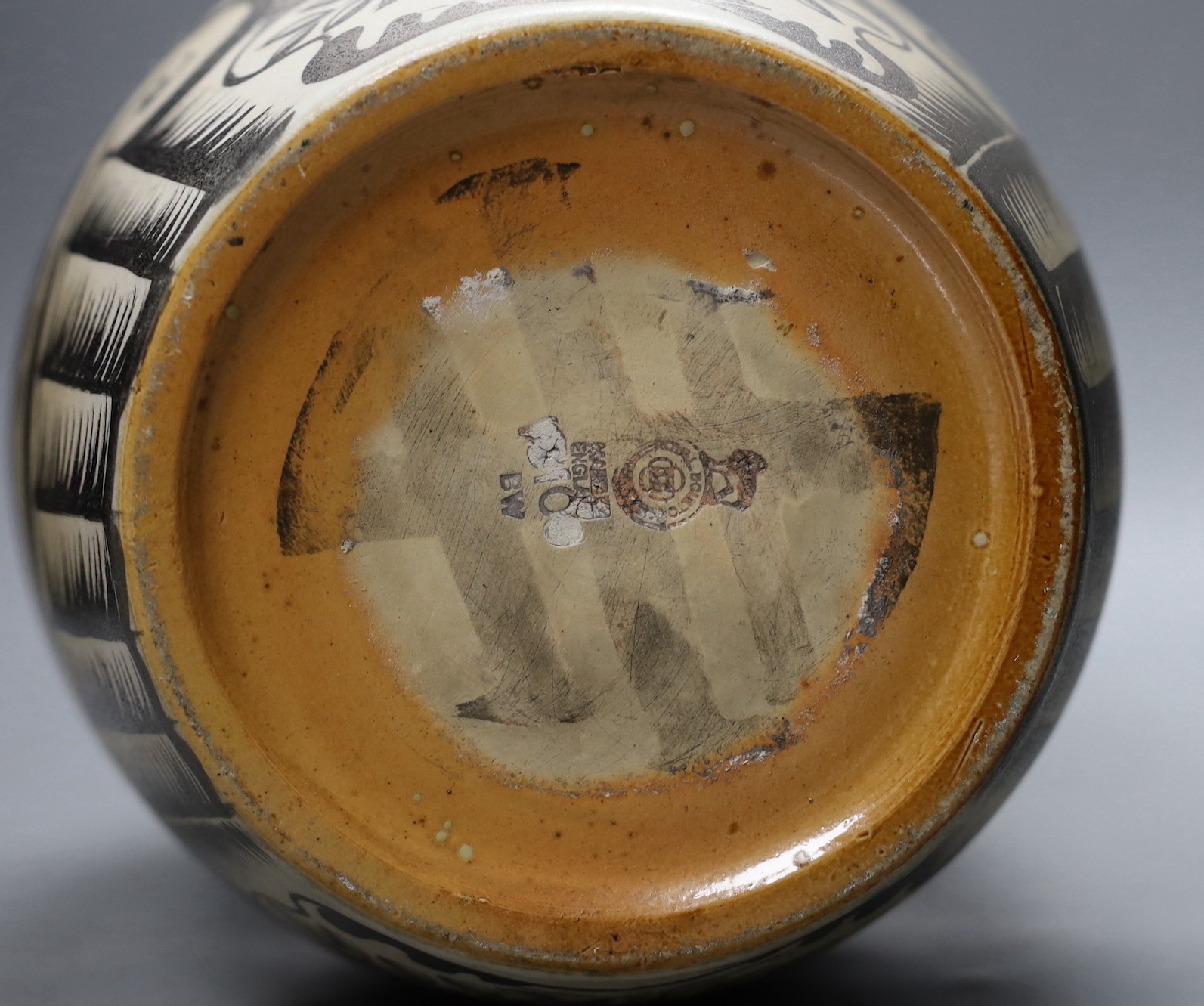 A possibly unique Royal Doulton Lambeth stoneware silver lustre vase, c.1936, painted with Greek style heads on a feather ground, inscribed ‘A*E*B 1936’, impressed marks to base, 30.5 cm high